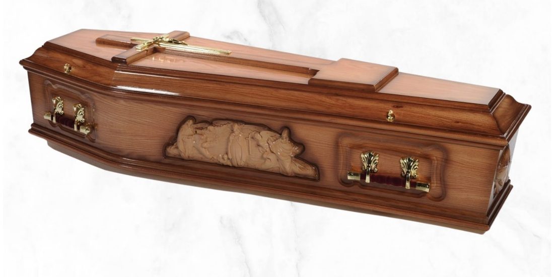 The Image engineered oak coffin with carved image panel and raised cross on the lid