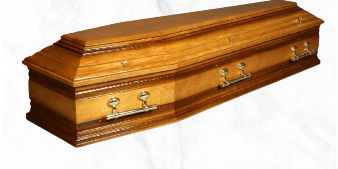 The Kenmare Italian-styled veneer oak coffin with rope design and brass barrel handles